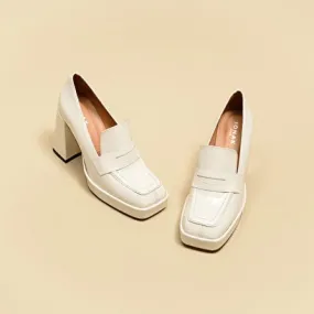 Heeled loafers in ecru patent