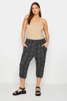 YOURS Curve Black Cropped Stripe Print Harem Joggers